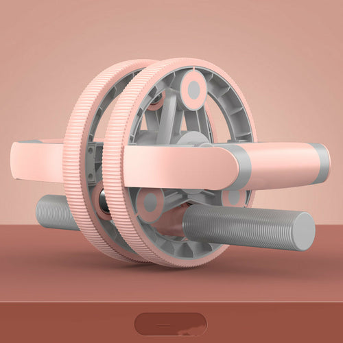 Victory Elite multifunctional abdominal muscle wheel for home gym, showing the compact design and handle grip in use.