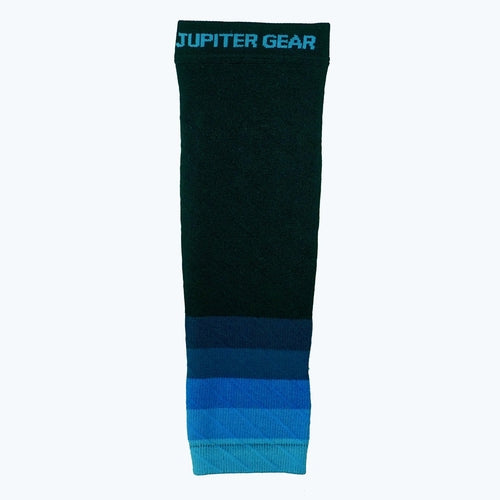 Victory Elite Endurance Compression Calf and Leg Sleeve for running and hiking, shown on a leg in a natural outdoor setting