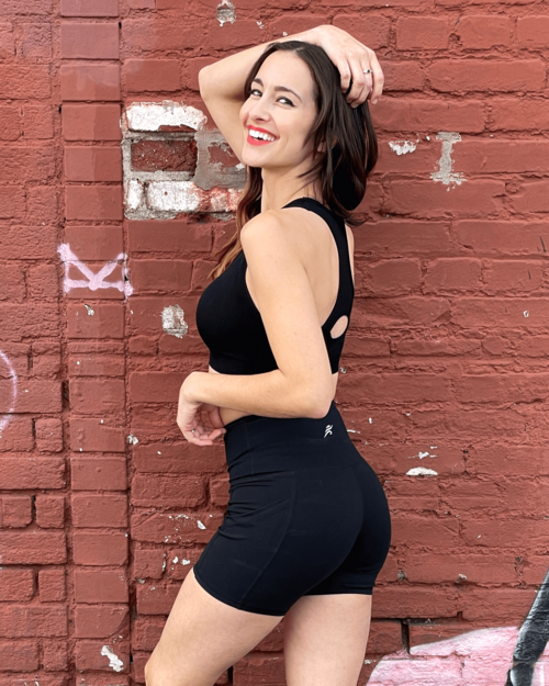 Victory Elite Jolie high-waisted athletic shorts with hip pockets, shown in black, designed for activewear and workout comfort.