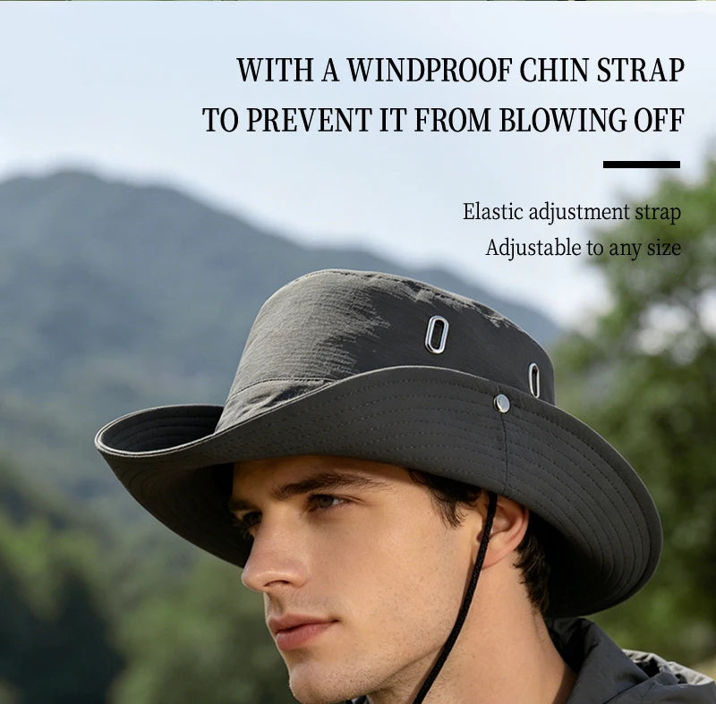 Victory Elite hiker and mountain print outdoor bucket hat with wide brim, breathable fabric, and adjustable drawstring for hiking and camping.