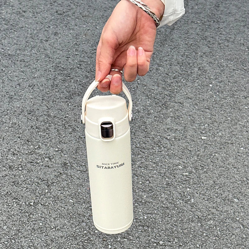 Victory Elite stainless steel vacuum flask, 500ml insulated sports bottle with wide handle for outdoor hydration and direct drinking.