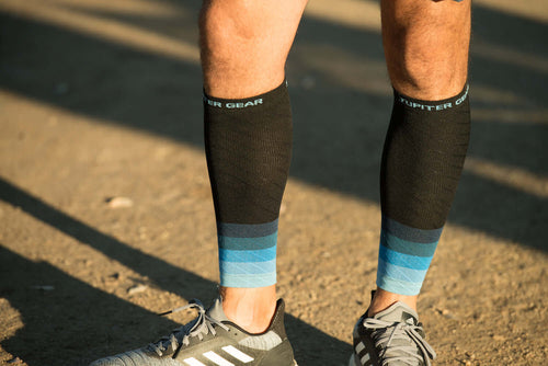 Victory Elite endurance compression calf and leg sleeve designed for running and hiking, shown on a person’s lower leg.